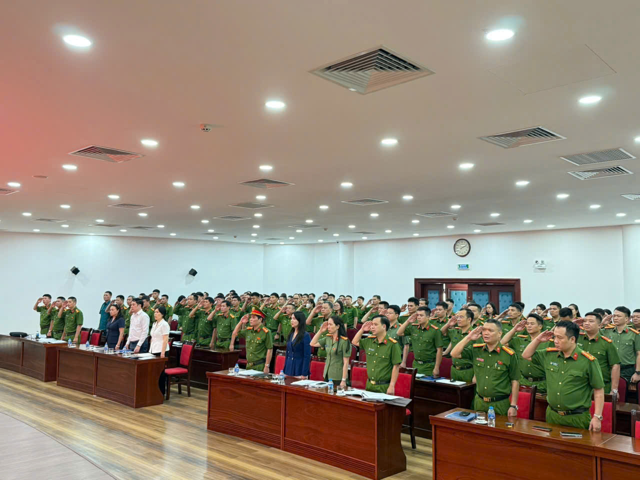 A group of people in uniform saluting  AI-generated content may be incorrect.
