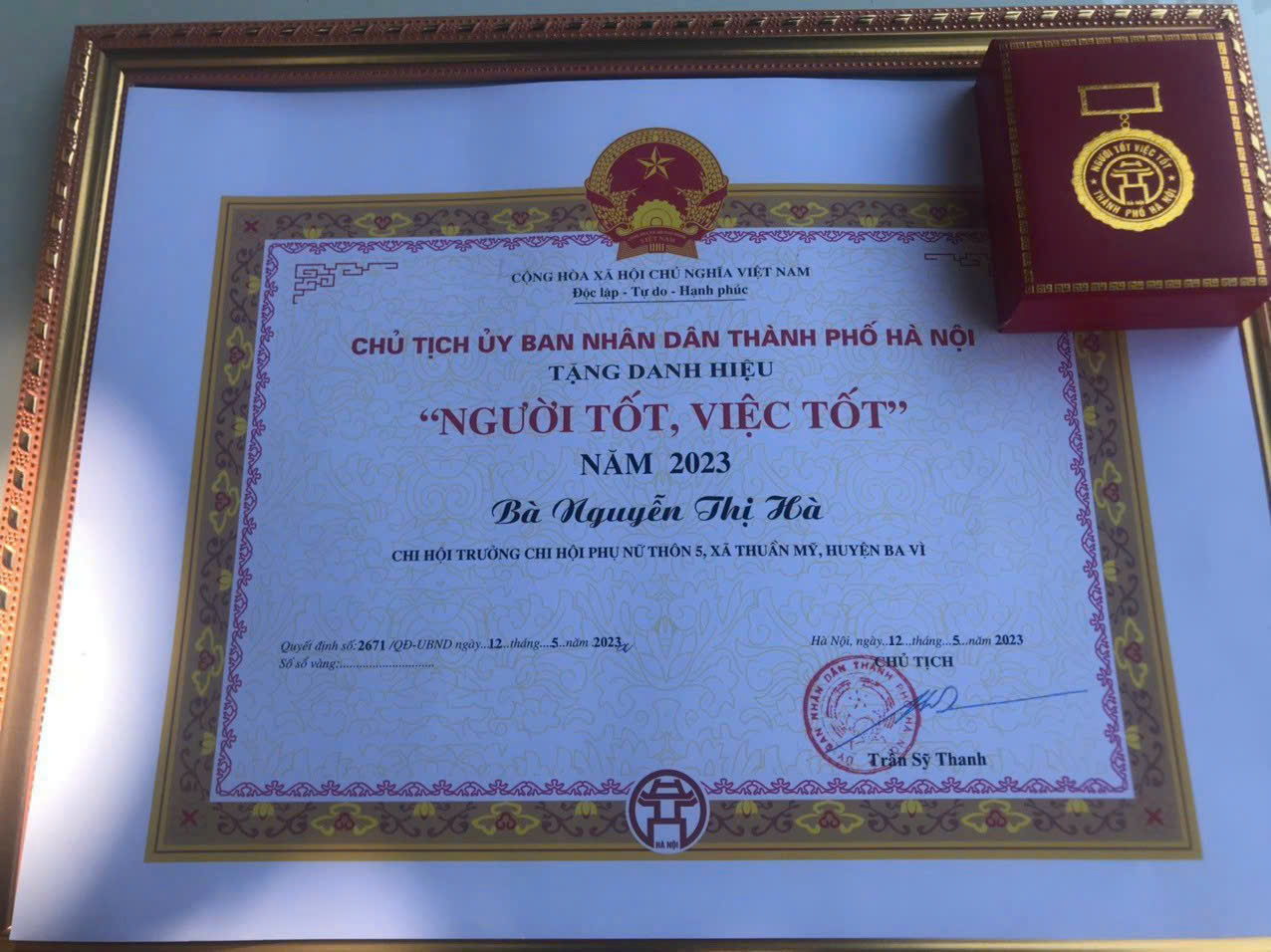 A certificate and a small box  Description automatically generated