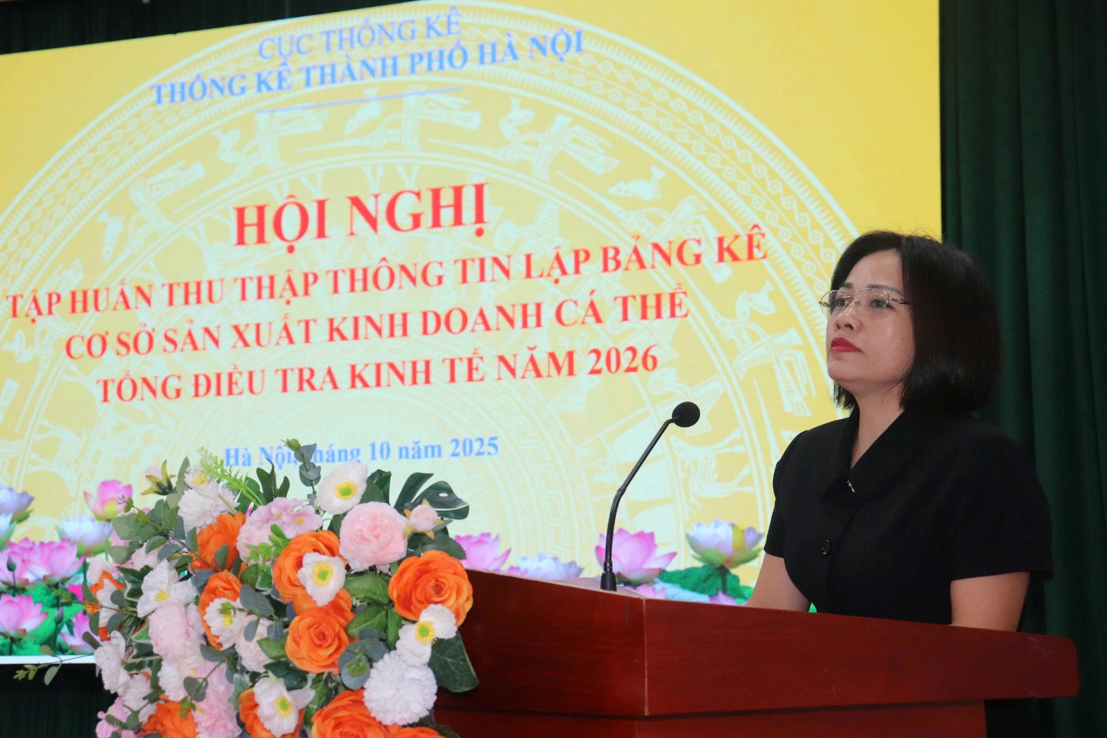 A person standing at a podium  AI-generated content may be incorrect.