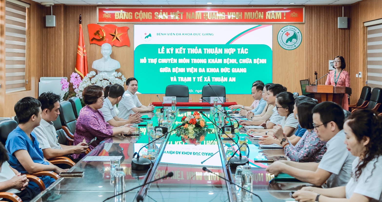 A group of people sitting at a table  AI-generated content may be incorrect.