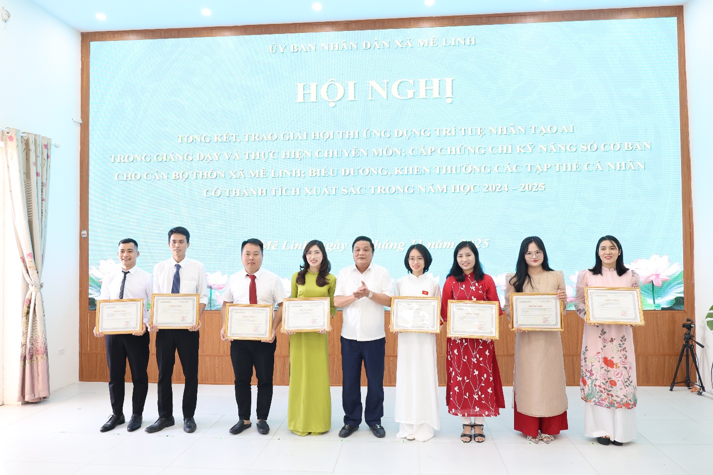 A group of people holding certificates  AI-generated content may be incorrect.