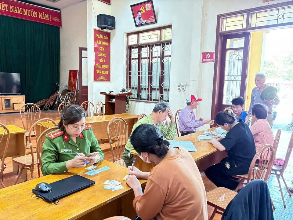 A group of people sitting at a table  Description automatically generated