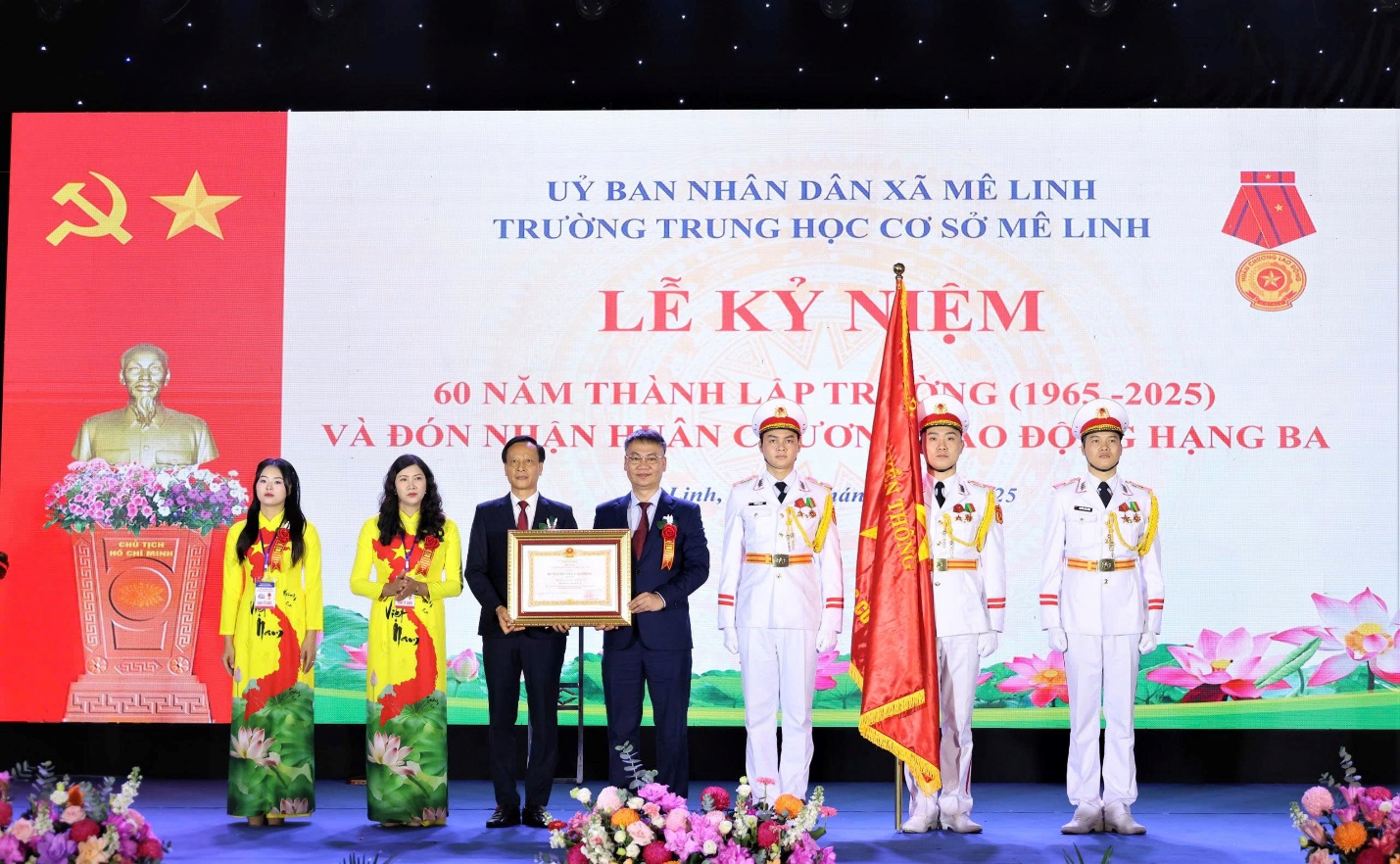 A group of people standing on a stage  AI-generated content may be incorrect.