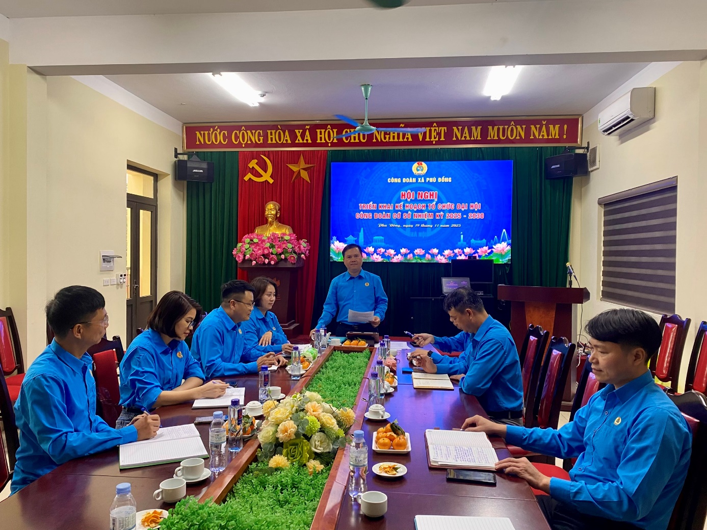 A group of people sitting around a table  AI-generated content may be incorrect.