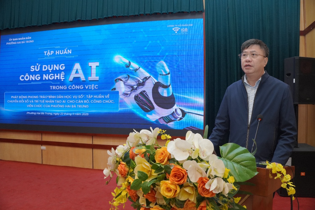 A person standing in front of a screen  AI-generated content may be incorrect.