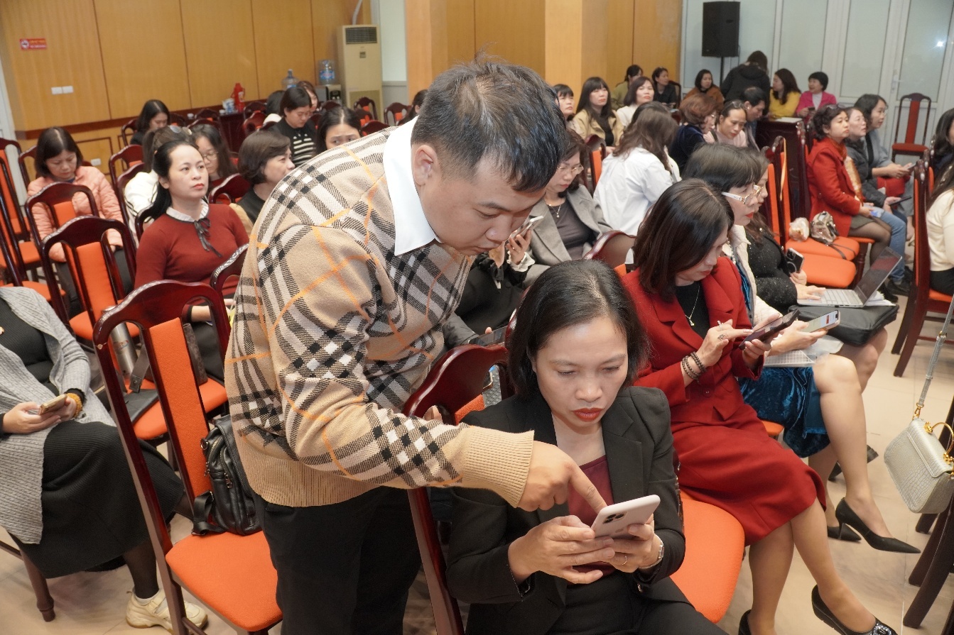 A person standing next to a person using a phone  AI-generated content may be incorrect.