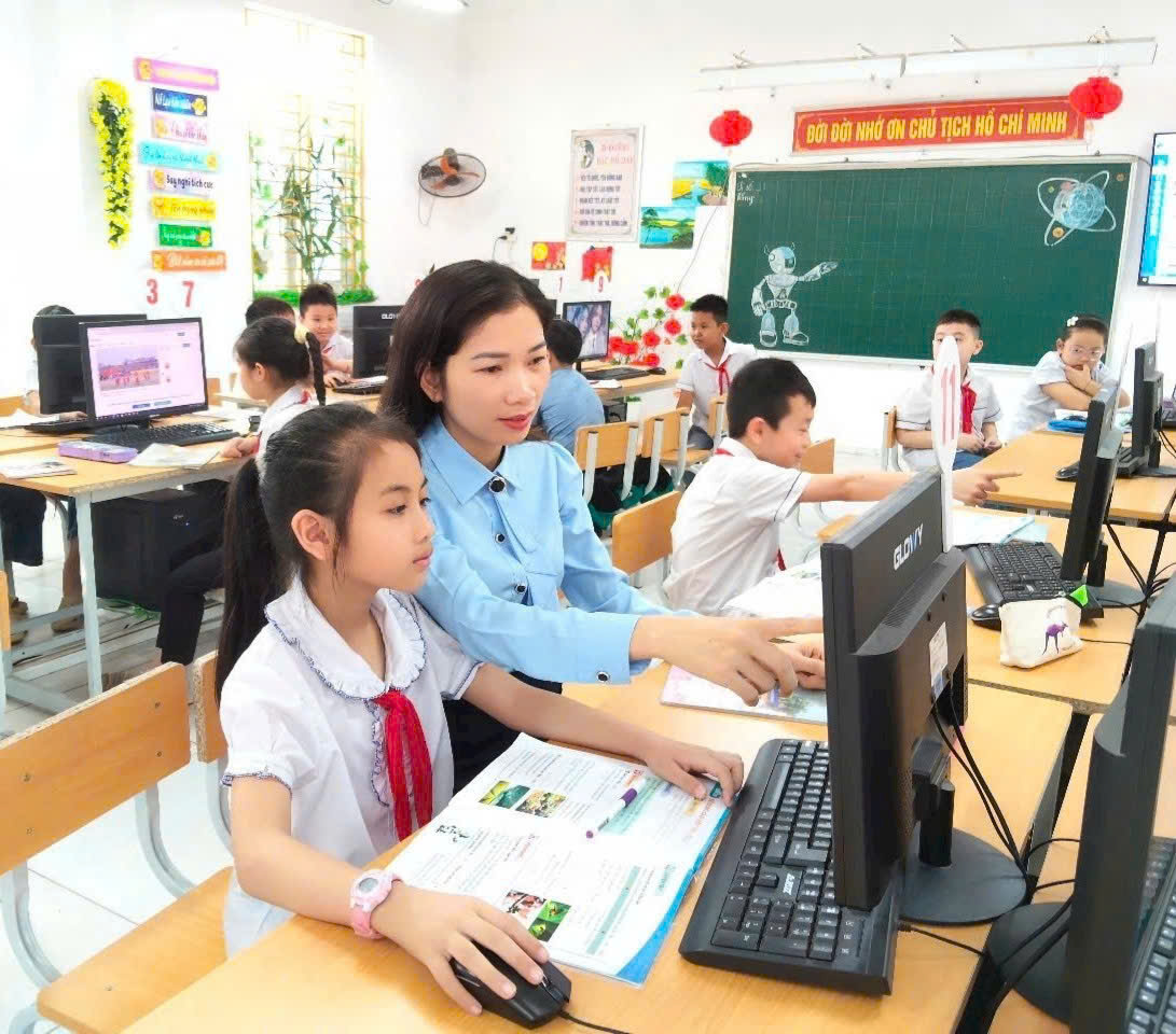 A teacher and students in a classroom  Description automatically generated