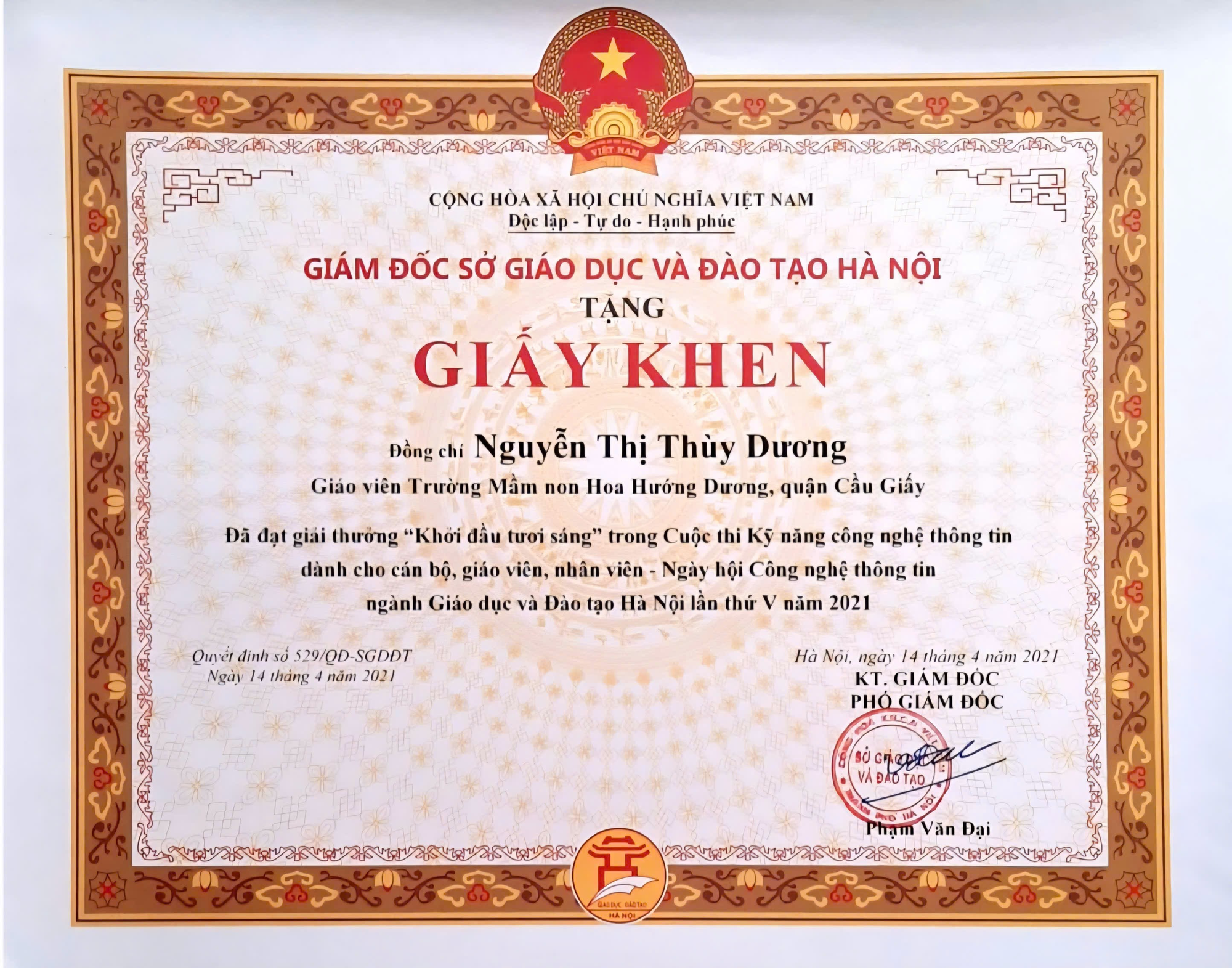 A certificate with red and gold border  Description automatically generated