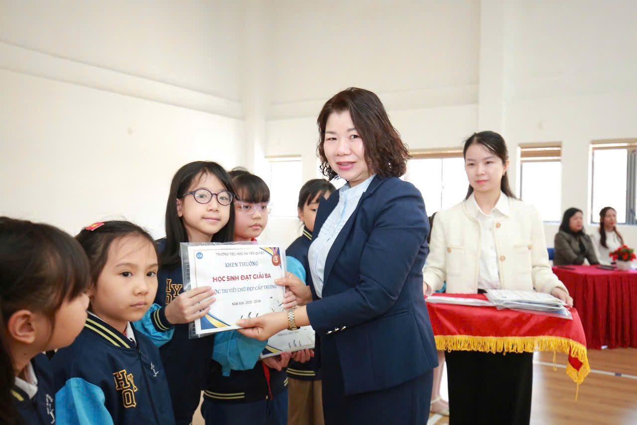 A person holding a certificate with other people  AI-generated content may be incorrect.