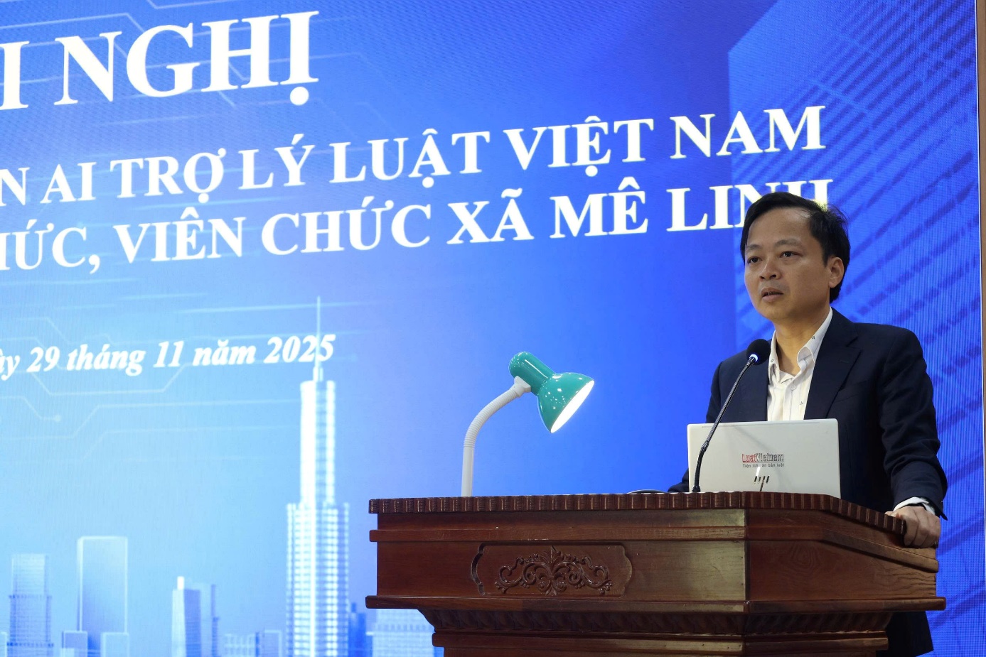 A person standing at a podium  AI-generated content may be incorrect.