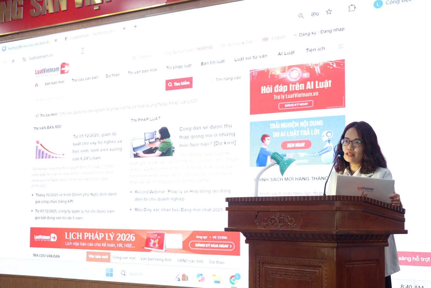 A person standing at a podium  AI-generated content may be incorrect.