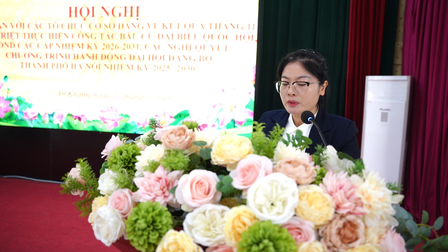 A person speaking at a podium with flowers  AI-generated content may be incorrect.