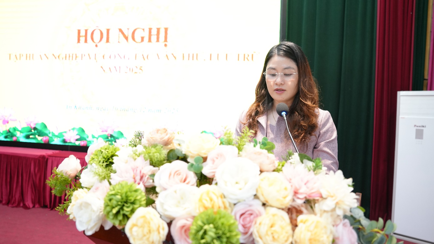 A person standing behind a microphone  AI-generated content may be incorrect.