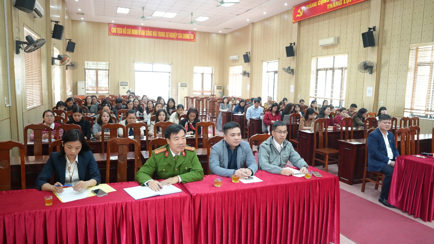 A group of people sitting at a table  AI-generated content may be incorrect.