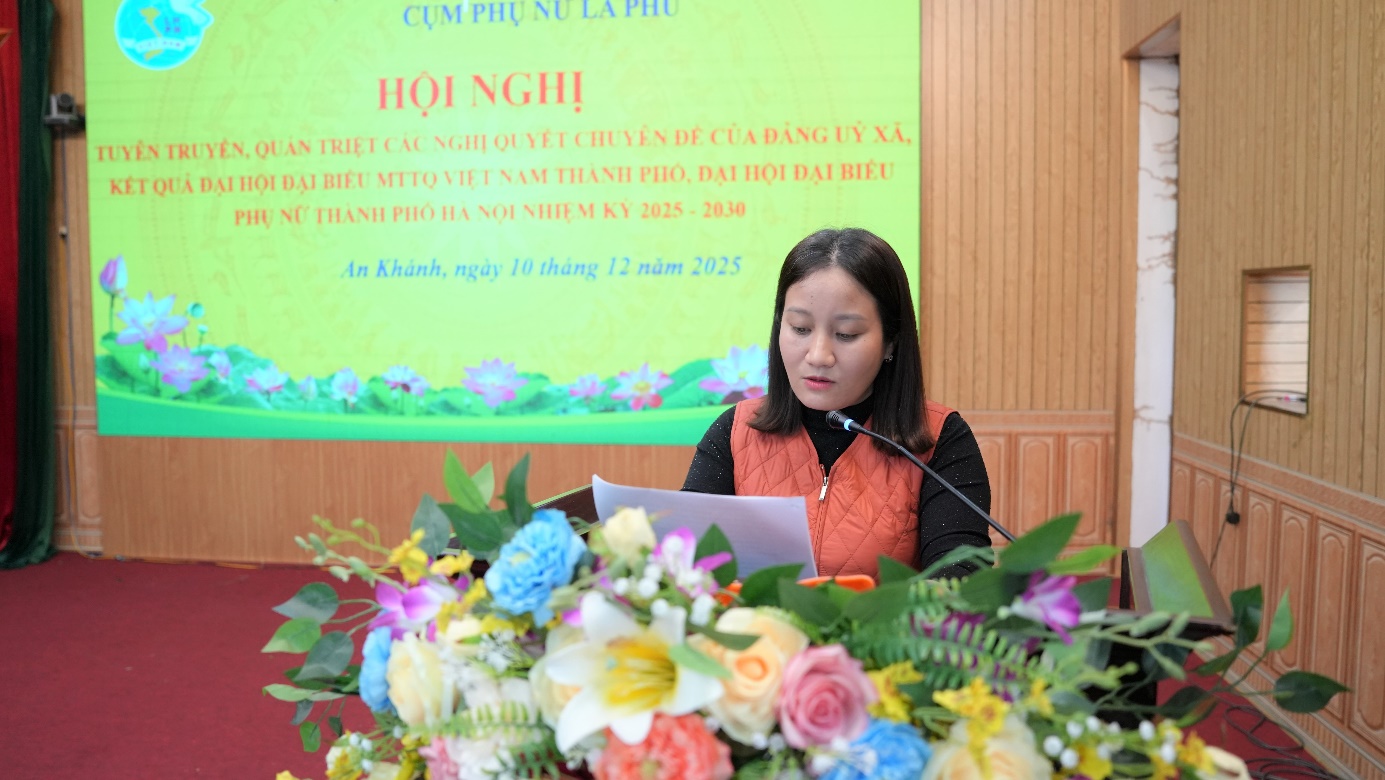 A person sitting at a podium with a microphone  AI-generated content may be incorrect.