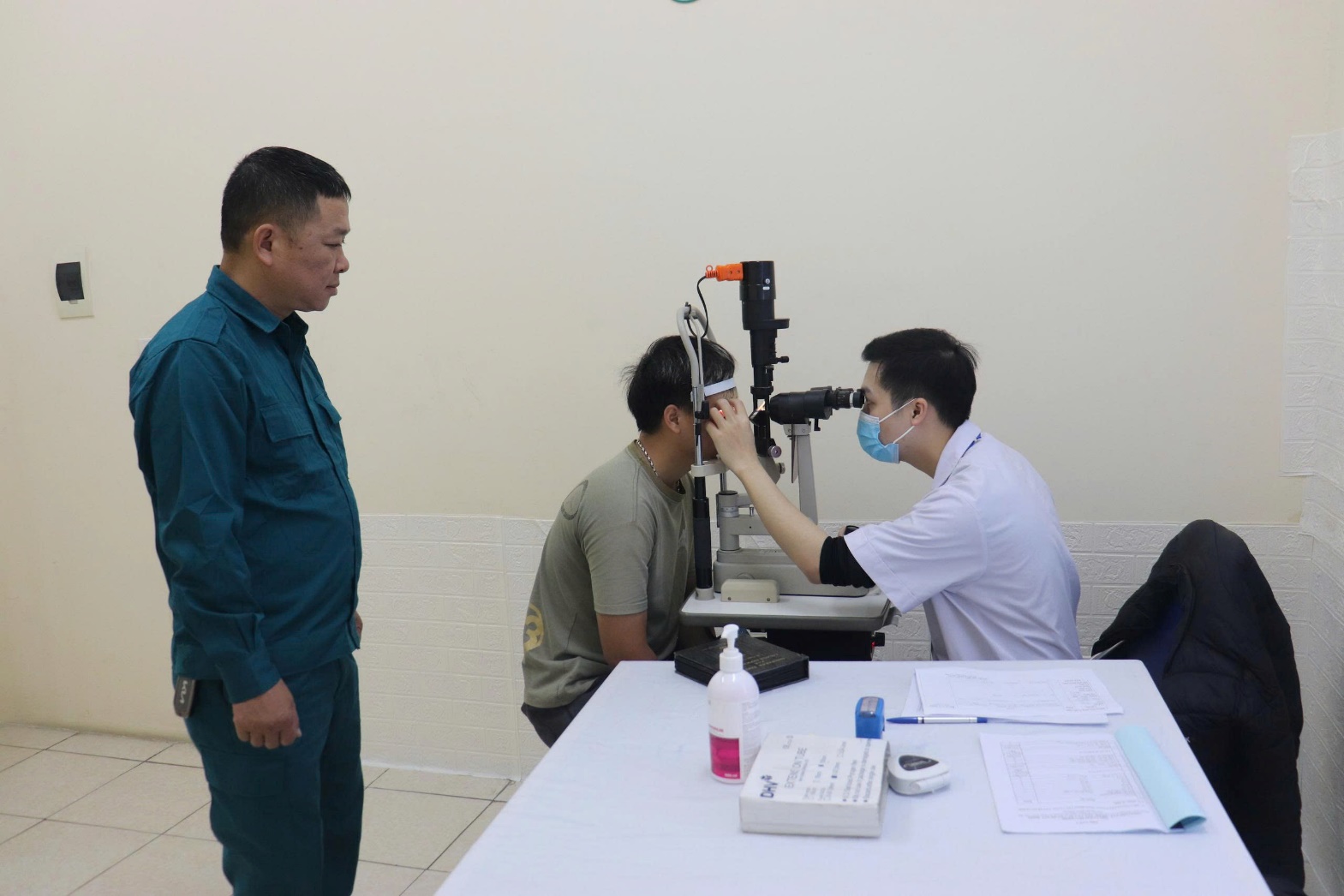 A person looking at a person's eye  AI-generated content may be incorrect.