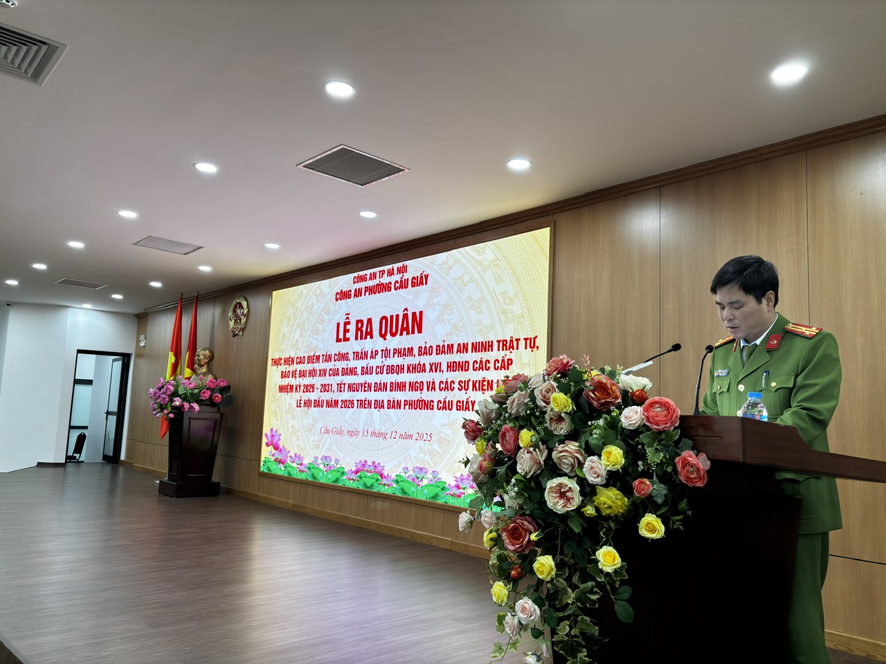 A person standing at a podium  AI-generated content may be incorrect.