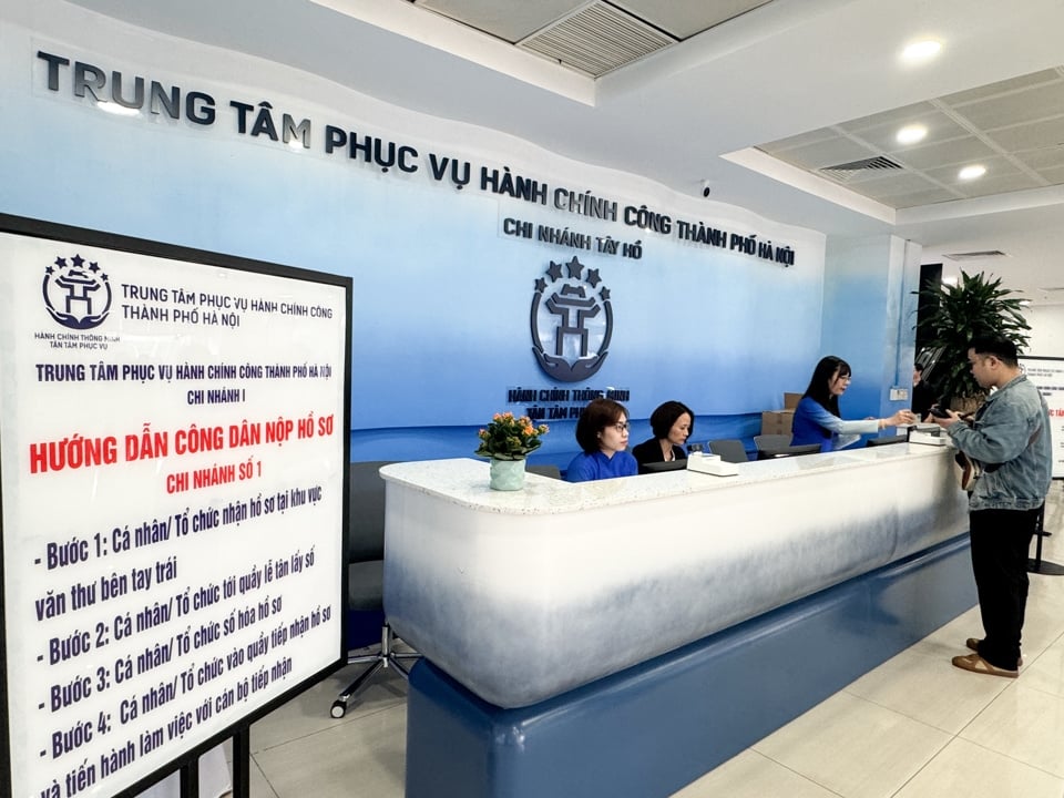 Hà Nội tái cấu trúc thủ tục đăng ký giao dịch bảo đảm, đẩy mạnh cung cấp dịch vụ công trực tuyến- Ảnh 1.