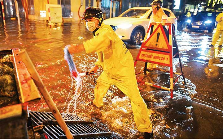 Chủ động phương án thoát nước cao điểm mùa mưa - Ảnh 1.