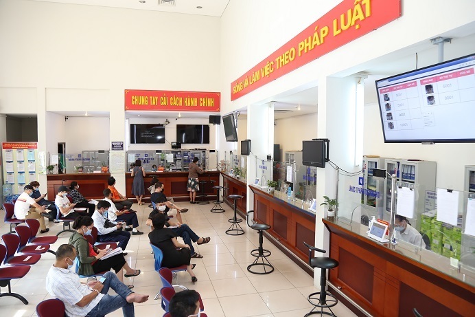 Hà Nội bổ sung điểm tiếp nhận, phục vụ hành chính công tại xã, phường mới- Ảnh 1.