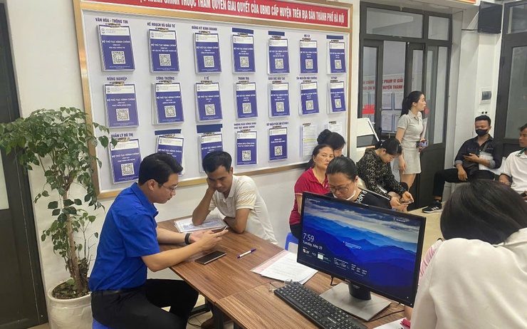 Hà Nội triển khai Chiến dịch hỗ trợ người dân thực hiện thủ tục hành chính tại xã, phường mới- Ảnh 1.