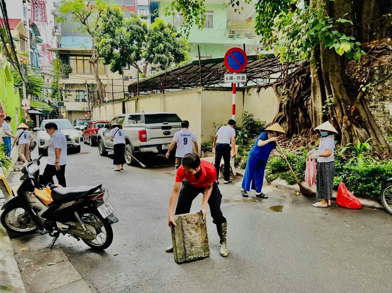A person with a box on a street  AI-generated content may be incorrect.