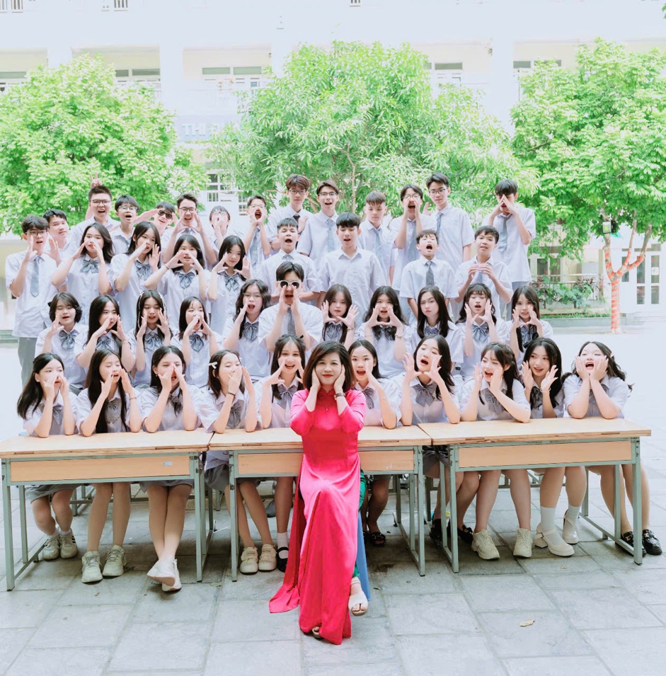 Người "truyền lửa" thầm lặng phía sau tập thể 9A2- Ảnh 1.
