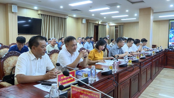 Đoàn đại biểu Quốc Hội thành phố Hà Nội (đơn vị bầu cử số 5) tiếp xúc cử tri 11 xã, phường sau kỳ họp thứ 9, Quốc Hội khóa XV- Ảnh 4.