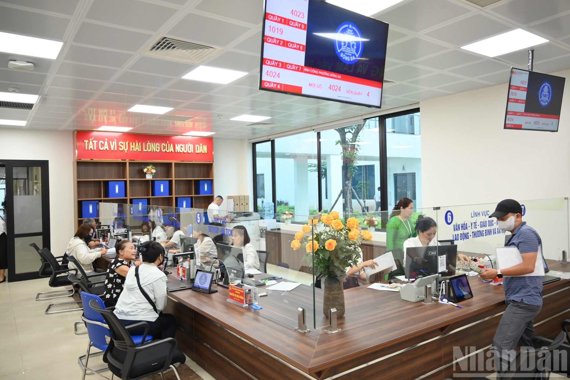 [Ảnh] Hà Nội ngày đầu làm việc chính quyền 2 cấp- Ảnh 10.