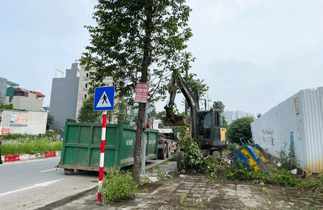 Phường Dương Nội ra quân kiểm tra, xử lý vi phạm về trật tự an toàn giao thông, trật tự đô thị, trật tự công cộng và vệ sinh môi trường - Ảnh 7.