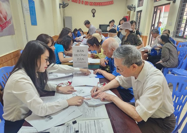 Không gián đoạn công tác chi trả lương hưu, trợ cấp BHXH khi vận hành chính quyền địa phương 2 cấp- Ảnh 1.