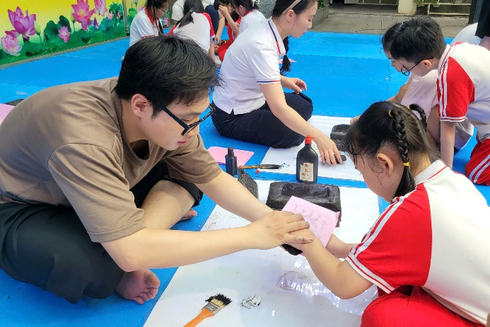 A person and a child painting  AI-generated content may be incorrect.