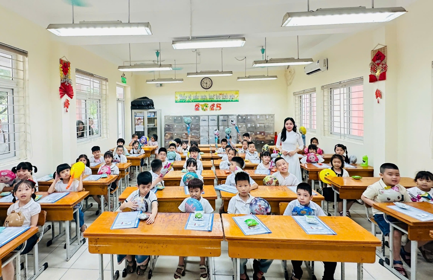 A group of children in a classroom  AI-generated content may be incorrect.