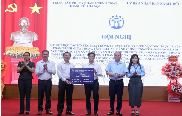 Hội nghị ký kết hợp tác, nâng cao chất lượng dịch vụ công trực tuyến, dịch vụ công toàn trình tại Mỹ Đức- Ảnh 2.