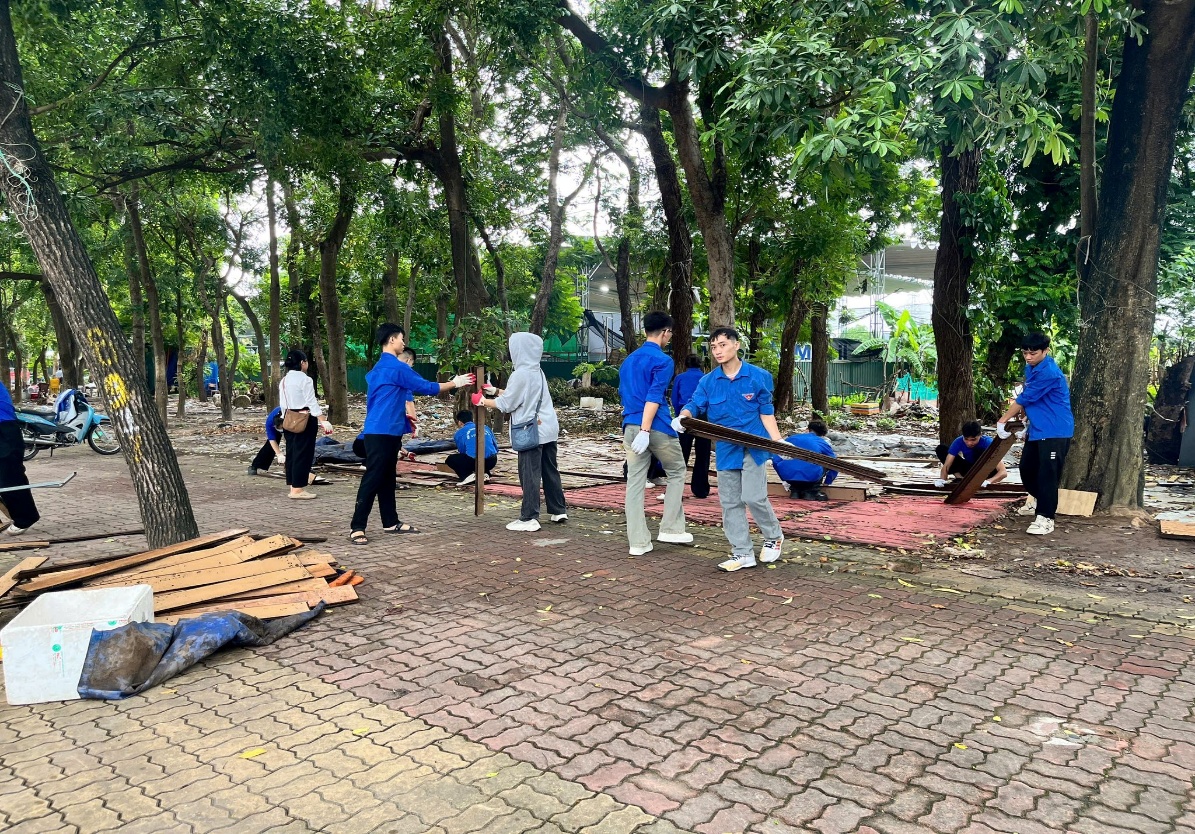 A group of people in blue shirts holding a stick  AI-generated content may be incorrect.