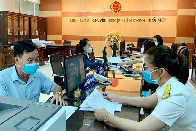 Tổng cục Thuế kêu gọi người dân không sử dụng hóa đơn bất hợp pháp- Ảnh 1.