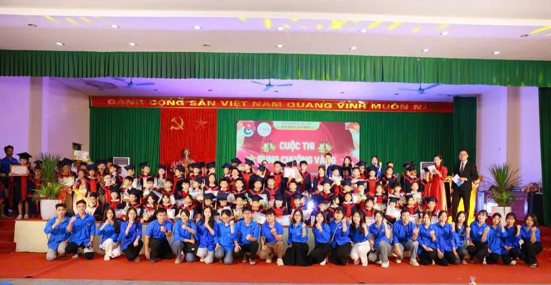 A group of people posing for a photo  Description automatically generated