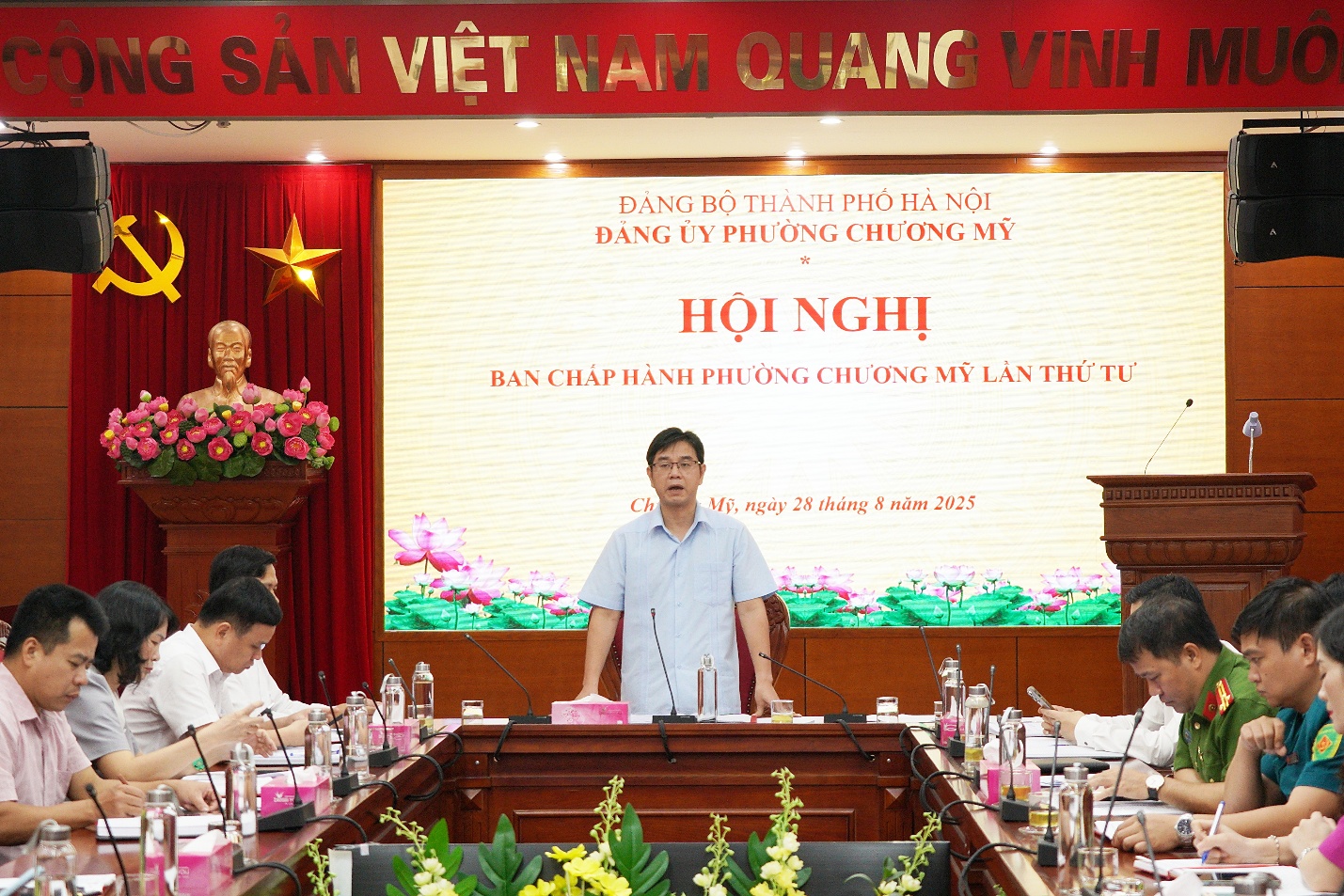 A person standing in front of a podium  AI-generated content may be incorrect.
