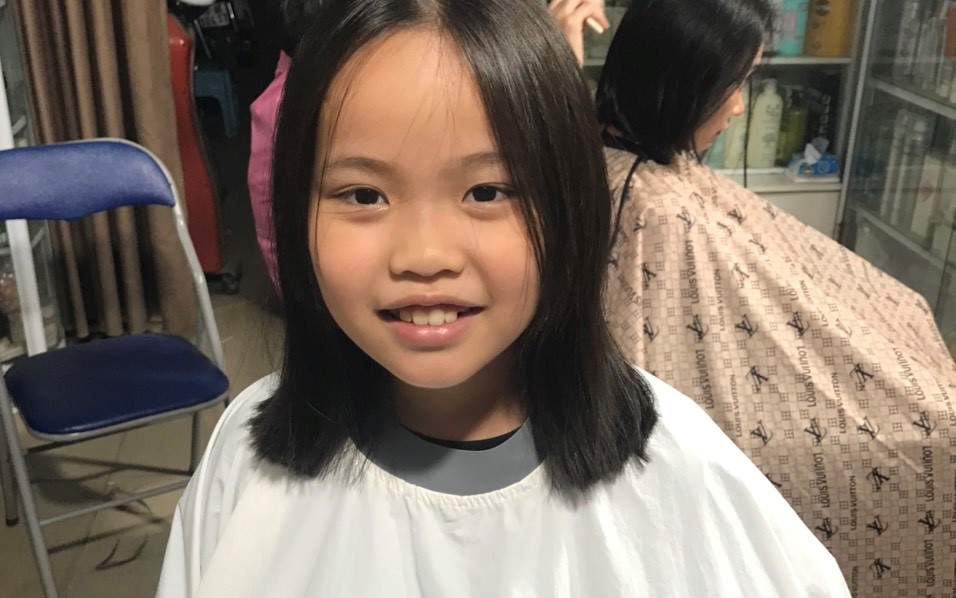 Ảnh em Hà khi cắt tóc hiến tặng