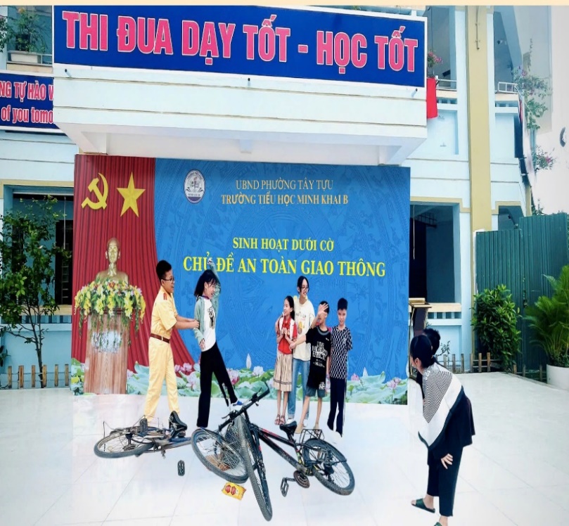 Trường Tiểu học Minh Khai B tổ chức Sinh hoạt dưới cờ với chủ đề “An toàn giao thông”- Ảnh 1.