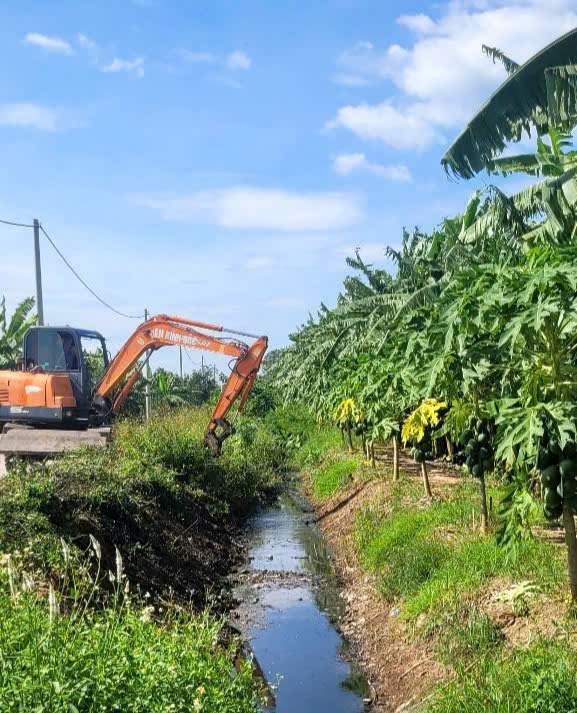 A construction vehicle in a ditch  AI-generated content may be incorrect.