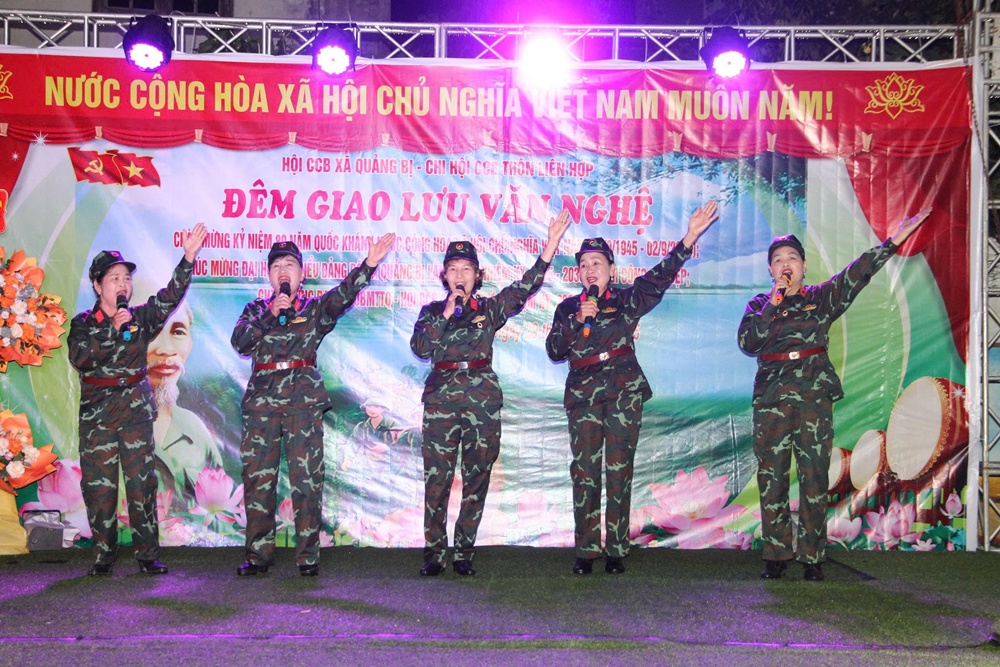 A group of people in military uniforms performing on stage  AI-generated content may be incorrect.