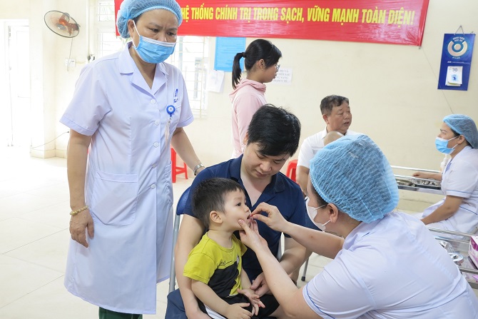 Tỷ lệ trẻ dưới 5 tuổi bị suy dinh dưỡng thể thấp còi còn 9,6%- Ảnh 1.
