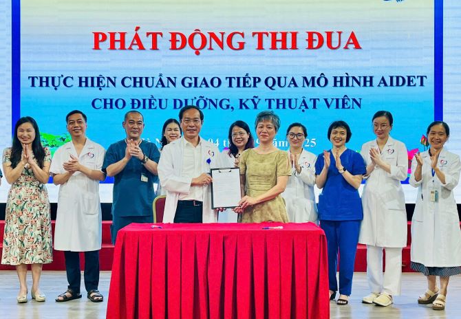 Bệnh viện Đa khoa Đống Đa phát động thi đua thực hiện chuẩn giao tiếp AIDET- Ảnh 1.