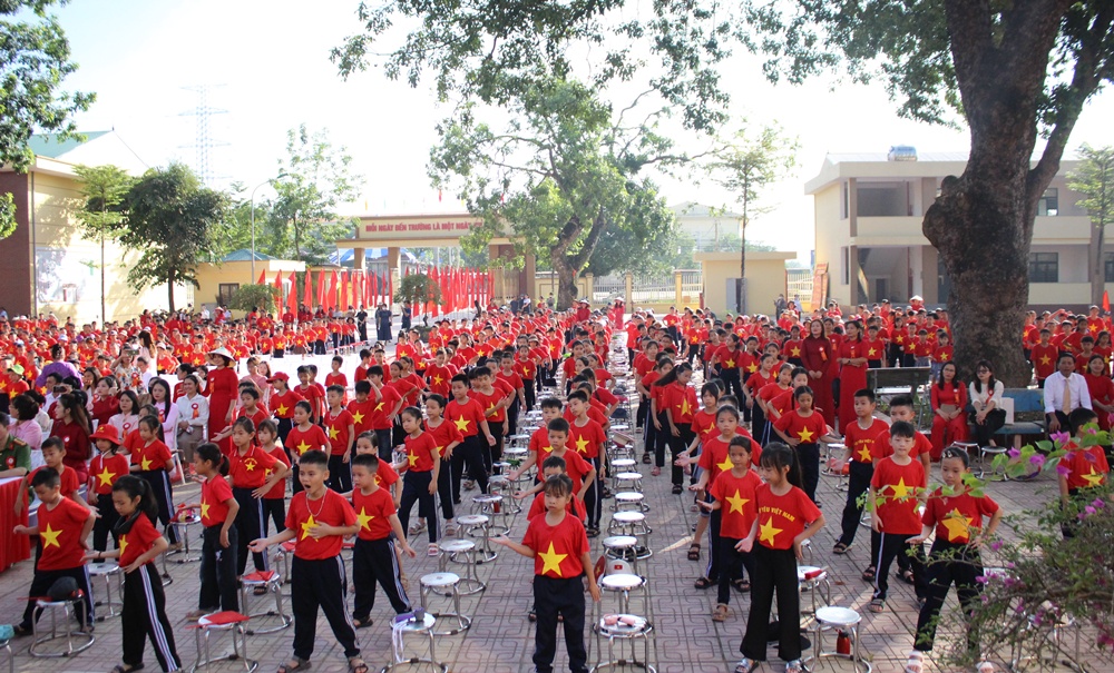 A group of children in red shirts  AI-generated content may be incorrect.