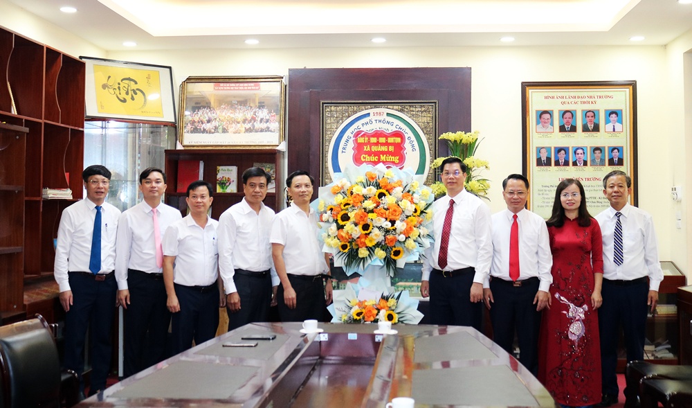 A group of men standing in front of a flower arrangement  AI-generated content may be incorrect.