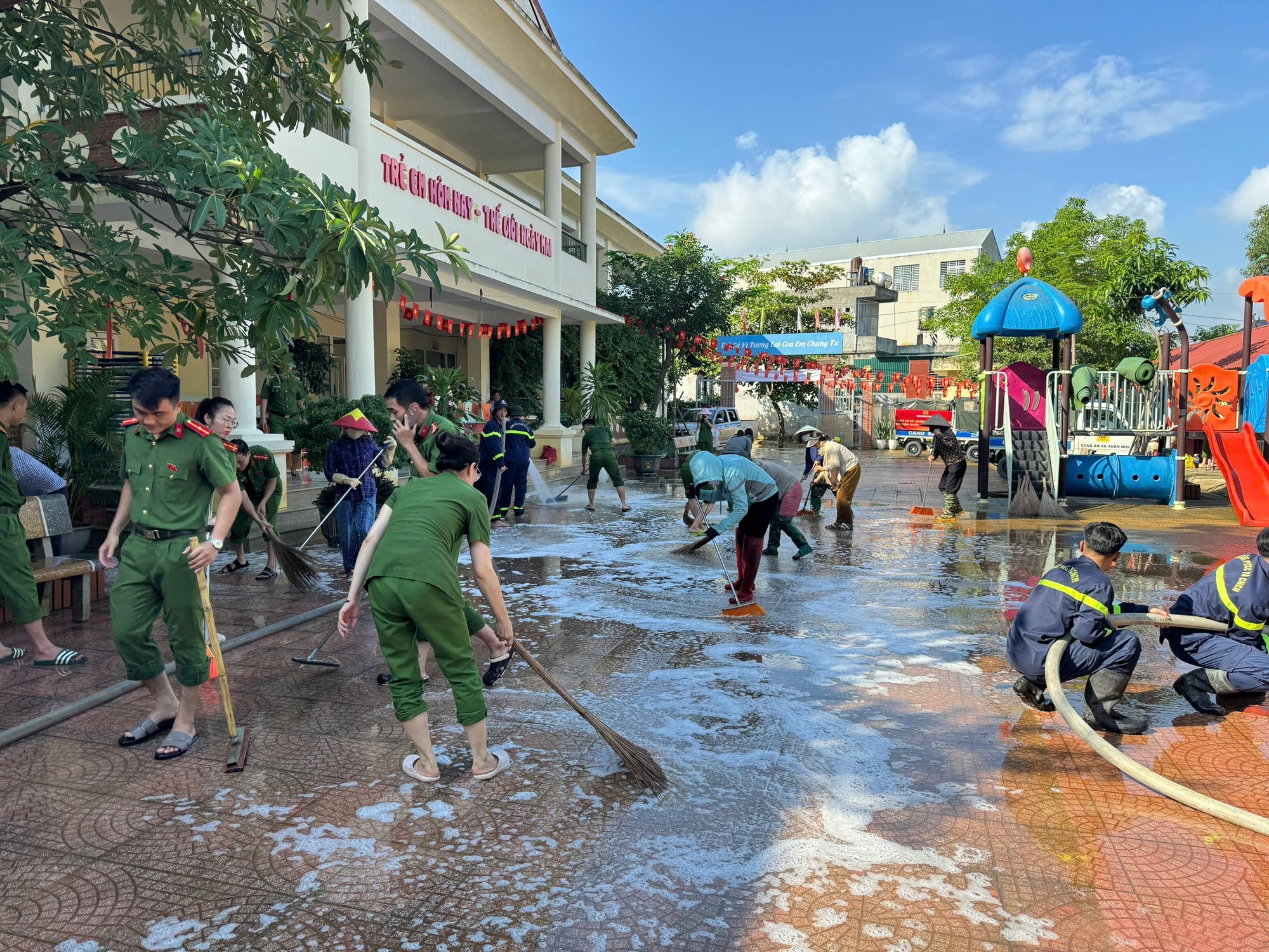 A group of people cleaning a street  AI-generated content may be incorrect.
