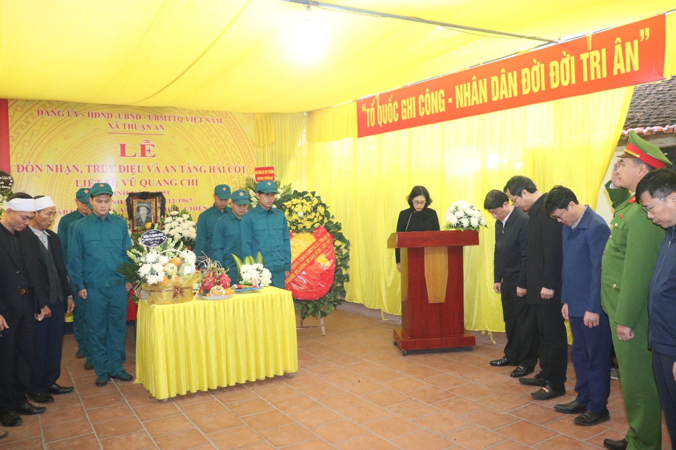 A group of people standing at a podium  AI-generated content may be incorrect.