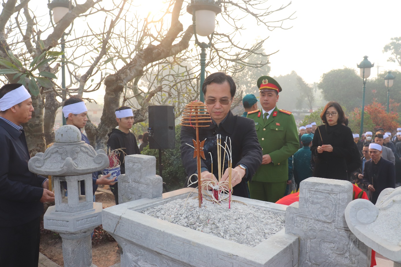 A person lighting a candle  AI-generated content may be incorrect.