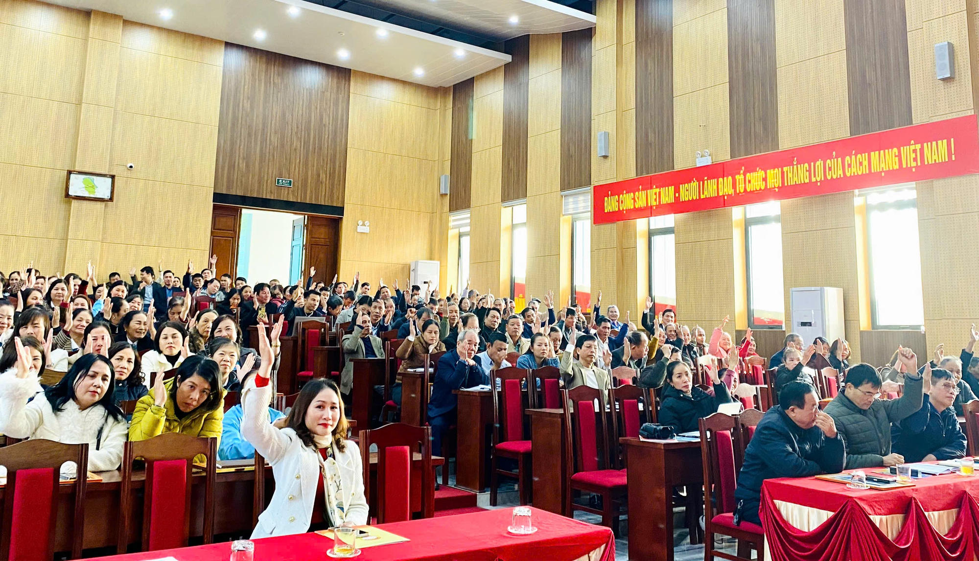 A group of people in a room  Description automatically generated